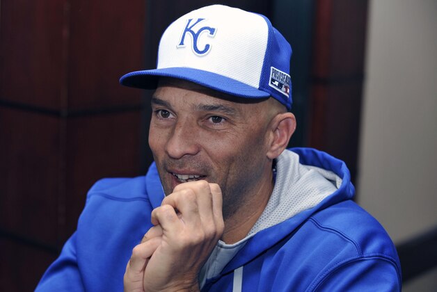 Oct 9, 2014; Baltimore, MD, USA; Kansas City Royals outfielder Raul Ibanez (18) is interviewed before workouts the day before game one of the 2014 ALCS at Oriole Park at Camden Yards. Mandatory Credit: Joy R. Absalon-USA TODAY Sports