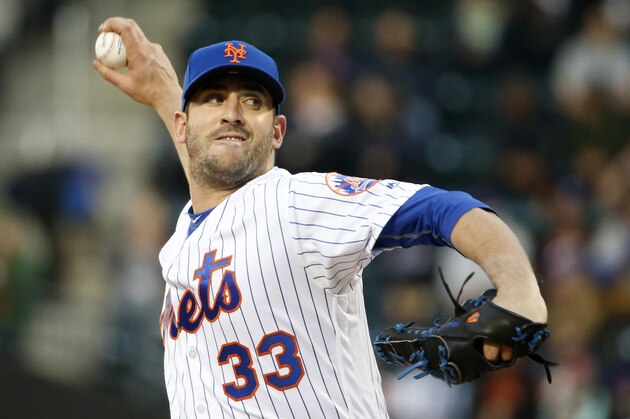 New York Mets starting pitcher Matt Harvey (33) delivers during the first inning of a baseball game against the Cincinnati Reds, Wednesday, April 27, 2016, in New York. (AP Photo/Kathy Willens)
