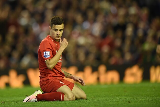 Liverpool's Brazilian midfielder Philippe Coutinho reacts after missing a shot on goal during the English Premier League football match between Liverpool and Everton at Anfield in Liverpool, north west England on April 20, 2016. / AFP / PAUL ELLIS / RESTRICTED TO EDITORIAL USE. No use with unauthorized audio, video, data, fixture lists, club/league logos or 'live' services. Online in-match use limited to 75 images, no video emulation. No use in betting, games or single club/league/player publications.  /         (Photo credit should read PAUL ELLIS/AFP/Getty Images)