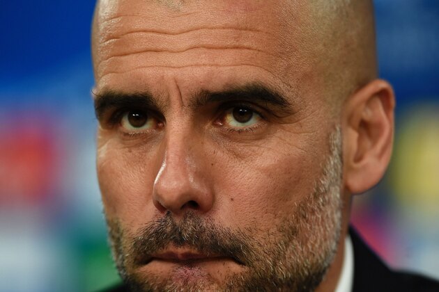 Bayern Munich's Spanish head coach Pep Guardiola takes part in a press conference at the Luz stadium in Lisbon on April 12, 2016, on the eve of the UEFA Champions League second leg quarter finals football match SL Benfica vs FC Bayern Munich. / AFP / FRANCISCO LEONG        (Photo credit should read FRANCISCO LEONG/AFP/Getty Images)