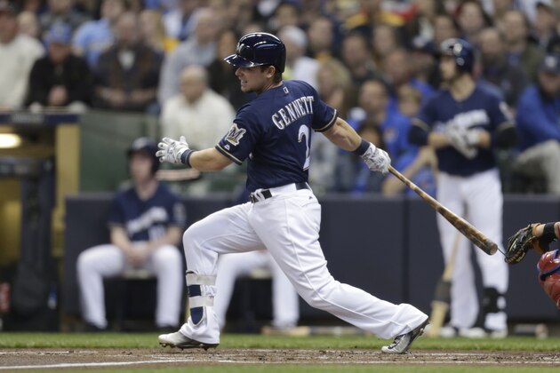 MILWAUKEE, WI - APRIL 23: Scooter Gennett #2 of the Milwaukee Brewers makes some contact at the plate during the game against the Philadelphia Phillies at Miller Park on April 23, 2016 in Milwaukee, Wisconsin. (Photo by Mike McGinnis/Getty Images)