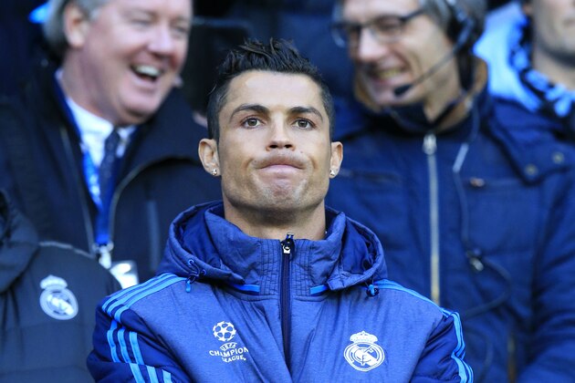 Real Madrid's Cristiano Ronaldo watches the math at the bench during the Champions League semifinal soccer match between Manchester City and Real Madrid, at the City of Manchester stadium in Manchester, England, Tuesday, April 26, 2016. (AP Photo/Jon Super)