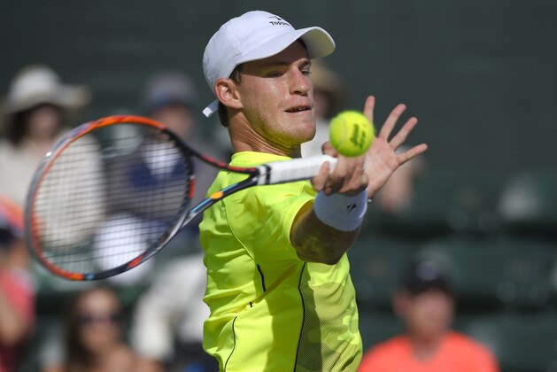 Diego Schwartzman, of Argentina, returns to Robin Haase, of the Netherlands, during their match at the BNP Paribas Open tennis tournament, Thursday, March 10, 2016, in Indian Wells, Calif. (AP Photo/Mark J. Terrill)