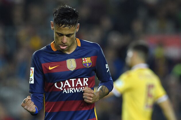 Barcelona's Brazilian forward Neymar celebrates after scoring during the Spanish league football match FC Barcelona vs Real Sporting de Gijï¿½ï¿½ï¿½ï¿½ï¿½ï¿½n at the Camp Nou stadium in Barcelona on April 23, 2016. / AFP / LLUIS GENE        (Photo credit should read LLUIS GENE/AFP/Getty Images)
