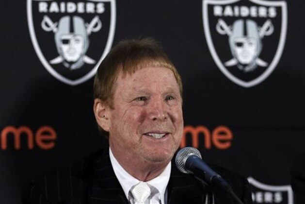 FILe - In this Feb. 11, 2016 file photo, Oakland Raiders owner Mark Davis speaks during a media conference in Oakland, Calif. Raiders owner Mark Davis says he wants to move the team to Las Vegas and is willing to spend a half billion dollars as part of a deal for a new stadium in the city. Davis upped the ante in a bid to move the team to this gambling city, appearing Thursday, April 28, 2016, alongside soccer great David Beckham and billionaire casino owner Sheldon Adelson before a committee studying the idea of a $1.4 billion stadium. (AP Photo/Ben Margot, File)