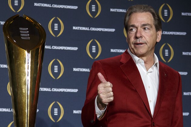 SCOTTSDALE, AZ - JANUARY 12: Head Coach Nick Saban of the Alabama Crimson Tide pose with the College Football Playoff National Championship Trophy during the MVP Press Conference after winning the College Football Playoff National Championship at the JW Marriott Camelback Inn on January 12, 2016 in Scottsdale, Arizona. (Photo by Don Juan Moore/Getty Images)