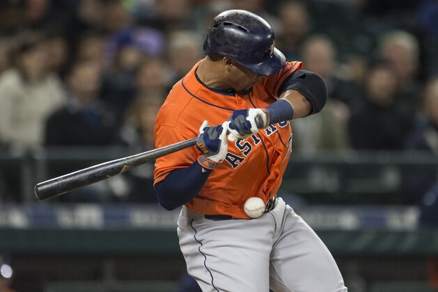SEATTLE, WA - APRIL 27: Carlos Gomez #30 of the Houston Astros is hit by pitch thrown by Hisashi Iwakuma #18 of the Seattle Mariners during the fourth inning at Safeco Field on April 27, 2016 in Seattle, Washington. Gomez would leave the game shortly afterward. (Photo by Stephen Brashear/Getty Images)