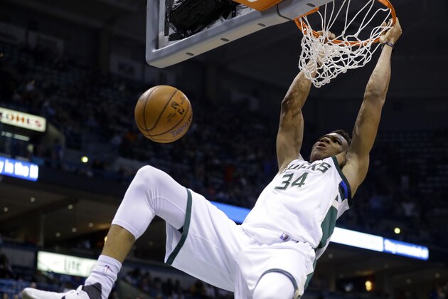 Milwaukee Bucks' Giannis Antetokounmpo dunks during the second half of an NBA basketball game against the Indiana Pacers Wednesday, April 13, 2016, in Milwaukee. (AP Photo/Morry Gash)