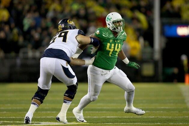 Oregon defensive lineman DeForest Buckner (44) tries to break through the offensive line during the first half of an NCAA college football game against California, Saturday, Nov. 7, 2015, in Eugene, Ore. (AP Photo/Ryan Kang)