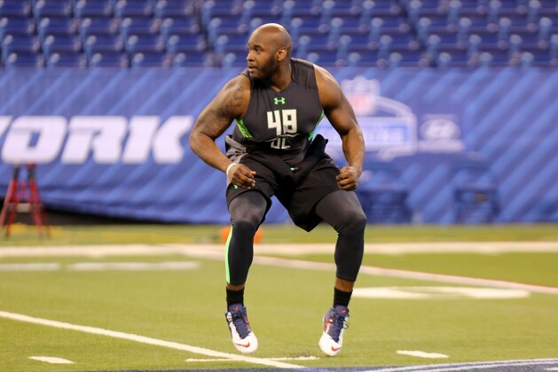 Mississippi offensive lineman Laremy Tunsil during a drill at the NFL football scouting combine Friday, Feb. 26, 2016, in Indianapolis. (AP Photo/Gregory Payan)