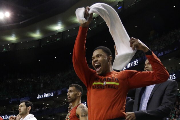 Atlanta Hawks forward Kent Bazemore cheers from the bench during the third quarter against the Boston Celtics in Game 6 of a first-round NBA basketball playoff series Thursday, April 28, 2016, in Boston. (AP Photo/Elise Amendola)