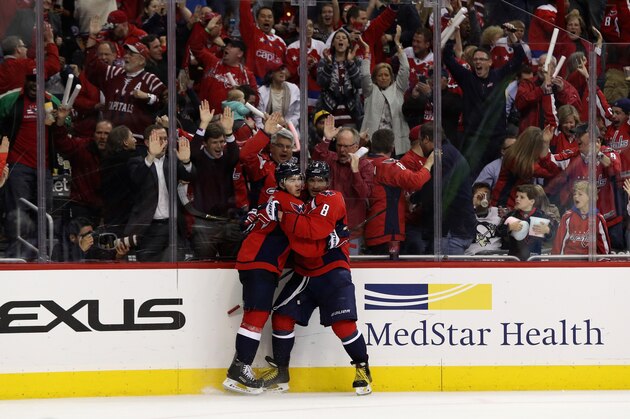 WASHINGTON, DC - APRIL 28: T.J. Oshie #77 of the Washington Capitals celebrates his second period goal with Alex Ovechkin against the Pittsburgh Penguins in Game One of the Eastern Conference Second Round during the 2016 NHL Stanley Cup Playoffs at Verizon Center on April 28, 2016 in Washington, DC.  (Photo by Rob Carr/Getty Images)