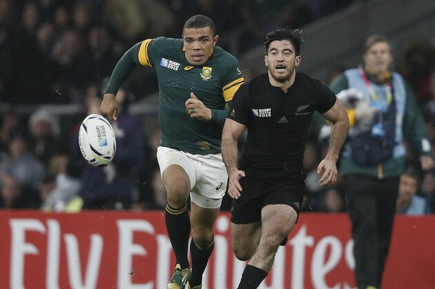 South Africa's wing Bryan Habana (L) and New Zealand's wing Nehe Milner-Skudder chase the ball  during a semi-final match of the 2015 Rugby World Cup between South Africa and New Zealand at Twickenham Stadium, southwest London, on October 24, 2015.  AFP PHOTO / ADRIAN DENNIS

RESTRICTED TO EDITORIAL USE, NO USE IN LIVE MATCH TRACKING SERVICES, TO BE USED AS NON-SEQUENTIAL STILLS        (Photo credit should read ADRIAN DENNIS/AFP/Getty Images)