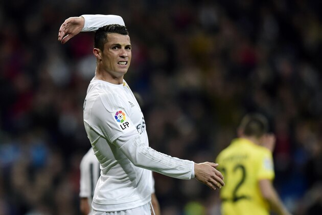 Real Madrid's Portuguese forward Cristiano Ronaldo gestures during the Spanish league football match Real Madrid CF vs Villarreal CF at the Santiago Bernabeu stadium in Madrid on April 20, 2016. / AFP / JAVIER SORIANO        (Photo credit should read JAVIER SORIANO/AFP/Getty Images)