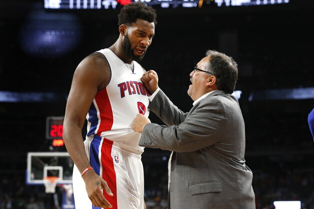 Detroit Pistons head coach Stan Van Gundy, right, congratulates center Andre Drummond in the second half of an NBA basketball game against the Indiana Pacers, Saturday, Dec. 12, 2015 in Auburn Hills, Mich. Detroit won 118-96. (AP Photo/Paul Sancya)
