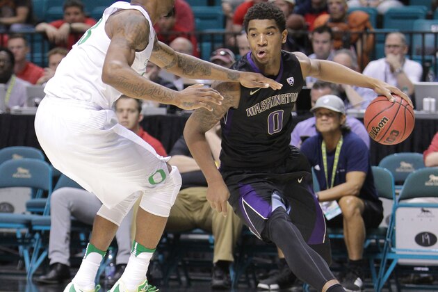 LAS VEGAS, NV - MARCH 10: Marquese Chriss #0 of the Washington Huskies handles the ball against Elgin Cook #23 of the Oregon Ducks during a quarterfinal game of the Pac-12 Basketball Tournament at MGM Grand Garden Arena on March 10, 2016 in Las Vegas, Nevada.  (Photo by Leon Bennett/Getty Images)