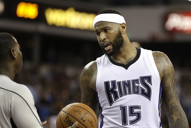 In this photo taken Wednesday, March 9, 2016, Sacramento Kings center DeMarcus Cousins questions official James Williams about a call during the second half of an NBA basketball game against the Cleveland Cavaliers in Sacramento, Calif. Kings Vice President of Basketball Operations and General Manager Vlade Divac announced Thursday, Cousins has been suspended for one game for conduct detrimental to the team. Cousins will miss Friday's game against the Orlando Magic.(AP Photo/Rich Pedroncelli)
