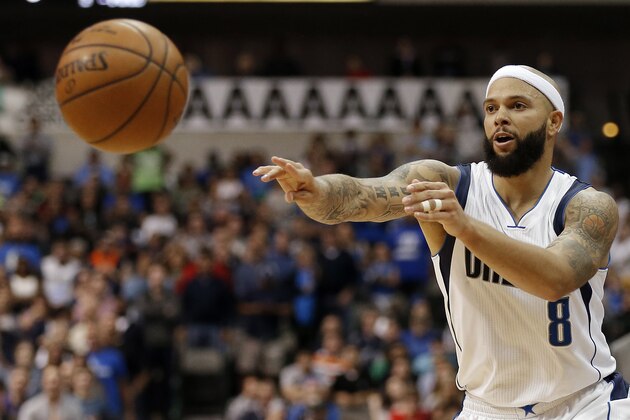 Dallas Mavericks guard Deron Williams (8) passes the ball during overtime of an NBA basketball game against the Portland Trail Blazers Sunday, March 20, 2016, in Dallas. Dallas won in overtime 132-120. (AP Photo/Brandon Wade)