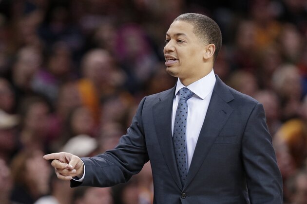 Cleveland Cavaliers head coach Tyronn Lue calls to a player on the bench in the first half of an NBA basketball game against the Charlotte Hornets, Sunday, April 3, 2016, in Cleveland. The Cavaliers won 112-103. (AP Photo/Tony Dejak)