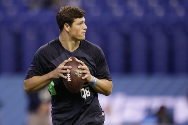 Penn State quarterback Christian Hackenberg runs a drill at the NFL football scouting combine in Indianapolis, Saturday, Feb. 27, 2016. (AP Photo/Michael Conroy)