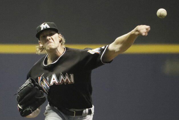 Miami Marlins starting pitcher Adam Conley throws during the seventh inning of a baseball game against the Milwaukee Brewers Friday, April 29, 2016, in Milwaukee. (AP Photo/Morry Gash)