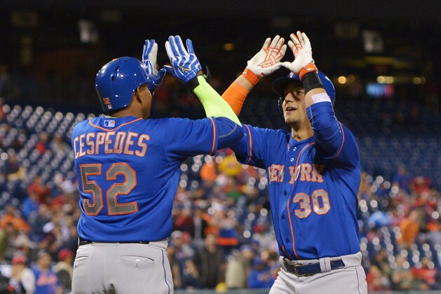 PHILADELPHIA, PA - SEPTEMBER 30: Yoenis Cespedes #52 of the New York Mets congratulates Michael Conforto #30 on his first inning home run against the Philadelphia Phillies at Citizens Bank Park on September 30, 2015 in Philadelphia, Pennsylvania. (Photo by Drew Hallowell/Getty Images)
