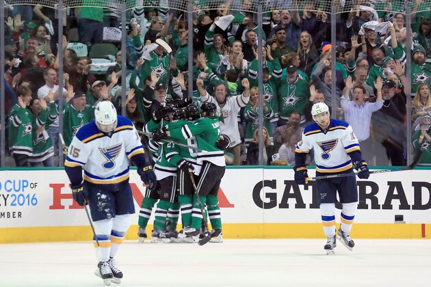 DALLAS, TX - APRIL 29:  Antoine Roussel #21 of the Dallas Stars celebrates with Radek Faksa #12 of the Dallas Stars after scoring a goal against Brian Elliott #1 of the St. Louis Blues in the second period in Game One of the Western Conference Second Round during the 2016 NHL Stanley Cup Playoffs at American Airlines Center on April 29, 2016 in Dallas, Texas.  (Photo by Tom Pennington/Getty Images)