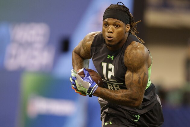 Alabama running back Derrick Henry runs a drill at the NFL football scouting combine in Saturday, Feb. 27, 2016, in Indianapolis. (AP Photo/Darron Cummings)