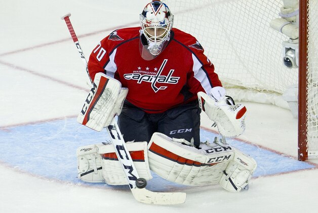 Washington Capitals goalie Braden Holtby (70) stops a shot from the Pittsburgh Penguins during the third period of Game 1 in an NHL hockey Stanley Cup Eastern Conference semifinals Thursday, April 28, 2016 in Washington. Capitals went on to win 4-3. (AP Photo/Pablo Martinez Monsivais)