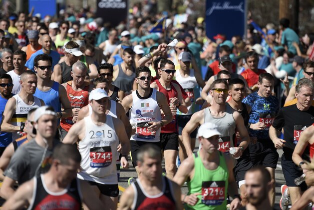 Apr 18, 2016; Boston, MA, USA;  Boston Marathon runners past the start line in Hopkington MA. Mandatory Credit: Bob DeChiara-USA TODAY Sports