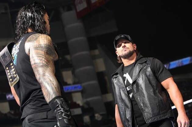 Roman Reigns and AJ Styles.