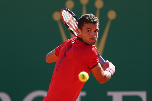 MONTE-CARLO, MONACO - APRIL 12: Grigor Dimitrov of Bulgaria in action during his 4-6,3-6 defeat against Gilles Simon of France during day three of the Monte Carlo Rolex Masters at Monte-Carlo Sporting Club on April 12, 2016 in Monte-Carlo, Monaco. (Photo by Michael Steele/Getty Images) MONTE-CARLO, MONACO - APRIL 12: Grigor Dimitrov of Bulgaria in action during his 4-6,3-6 defeat against Gilles Simon of France during day three of the Monte Carlo Rolex Masters at Monte-Carlo Sporting Club on April 12, 2016 in Monte-Carlo, Monaco. (Photo by Michael Steele/Getty Images)