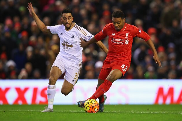 LIVERPOOL, ENGLAND - NOVEMBER 29:  Jordon Ibe of Liverpool takes on Neil Taylor of Swansea City during the Barclays Premier League match between Liverpool and Swansea City at Anfield on November 29, 2015 in Liverpool, England.  (Photo by Alex Livesey/Getty Images)