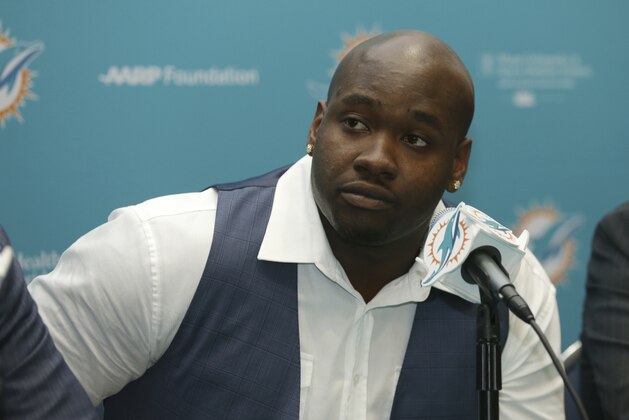 Former Mississippi offensive lineman and top Miami Dolphins draft pick Laremy Tunsil, listens during a news conference, Friday, April 29, 2016 in Davie, Fla. Tunsil was selected 13th overall in the NFL draft Thursday night. (AP Photo/Lynne Sladky)