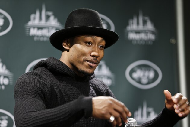 New York Jets wide receiver Brandon Marshall responds to questions during a news conference after an NFL football game against the New England Patriots Sunday, Dec. 27, 2015, in East Rutherford, N.J. The Jets won 26-20. (AP Photo/Seth Wenig)