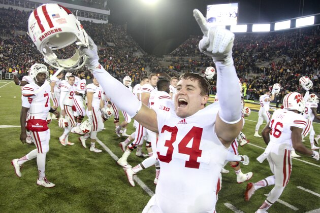 IOWA CITY, IA - NOVEMBER 22: Fullback Derek Watt #34 of the Wisconsin Badgers celebrates after defeating the Iowa Hawkeyes, on November 22, 2014 at Kinnick Stadium, in Iowa City, Iowa. Wisconsin won 26-24. (Photo by Matthew Holst/Getty Images)