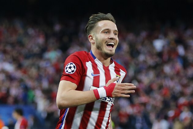 Atletico's Saul celebrates after scoring his side's opening goal during the Champions League 1st leg semifinal soccer match between Atletico Madrid and Bayern Munich at the Vicente Calderon stadium in Madrid, Spain, Wednesday, April 27, 2016. (AP Photo/Paul White)