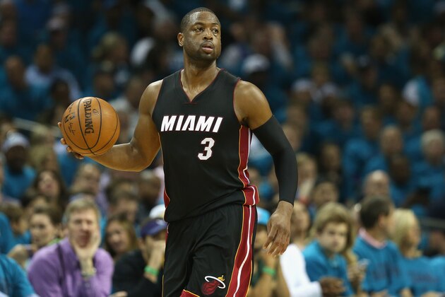 CHARLOTTE, NC - APRIL 29:  Dwyane Wade #3 of the Miami Heat brings the ball up the court against the Charlotte Hornets during game six of the Eastern Conference Quarterfinals of the 2016 NBA Playoffs at Time Warner Cable Arena on April 29, 2016 in Charlotte, North Carolina.  NOTE TO USER: User expressly acknowledges and agrees that, by downloading and or using this photograph, User is consenting to the terms and conditions of the Getty Images License Agreement.  (Photo by Streeter Lecka/Getty Images)