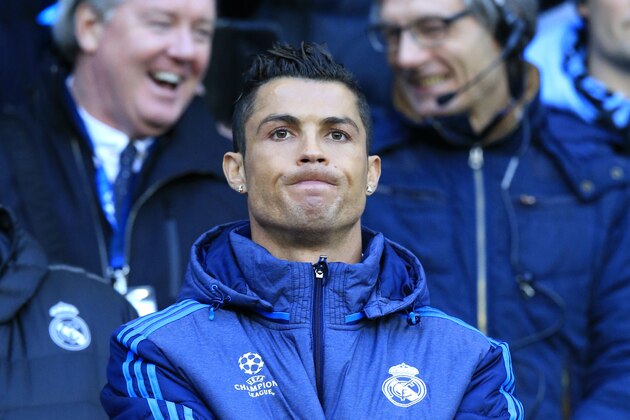 Real Madrid's Cristiano Ronaldo watches the math at the bench during the Champions League semifinal soccer match between Manchester City and Real Madrid, at the City of Manchester stadium in Manchester, England, Tuesday, April 26, 2016. (AP Photo/Jon Super)