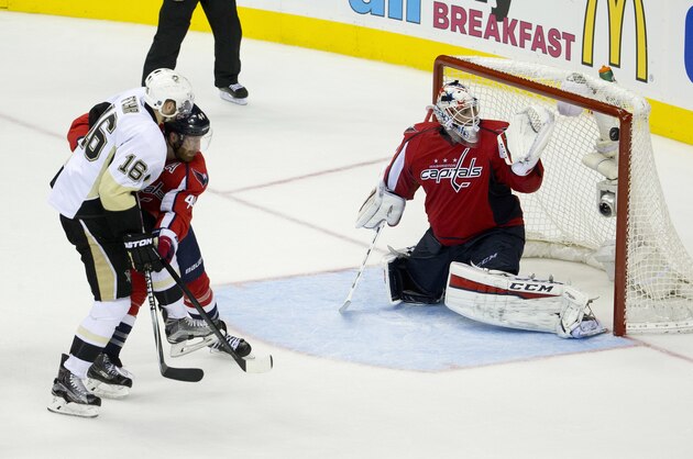 Pittsburgh Penguins right wing Eric Fehr (16) watches his shot go past Washington Capitals goalie Braden Holtby (70) for the tie-breaking goal, as Brooks Orpik defends during the third period of Game 2 in an NHL hockey Stanley Cup Eastern Conference semifinals Saturday, April 30, 2016 in Washington. Pittsburgh won 2-1. (AP Photo/Pablo Martinez Monsivais)