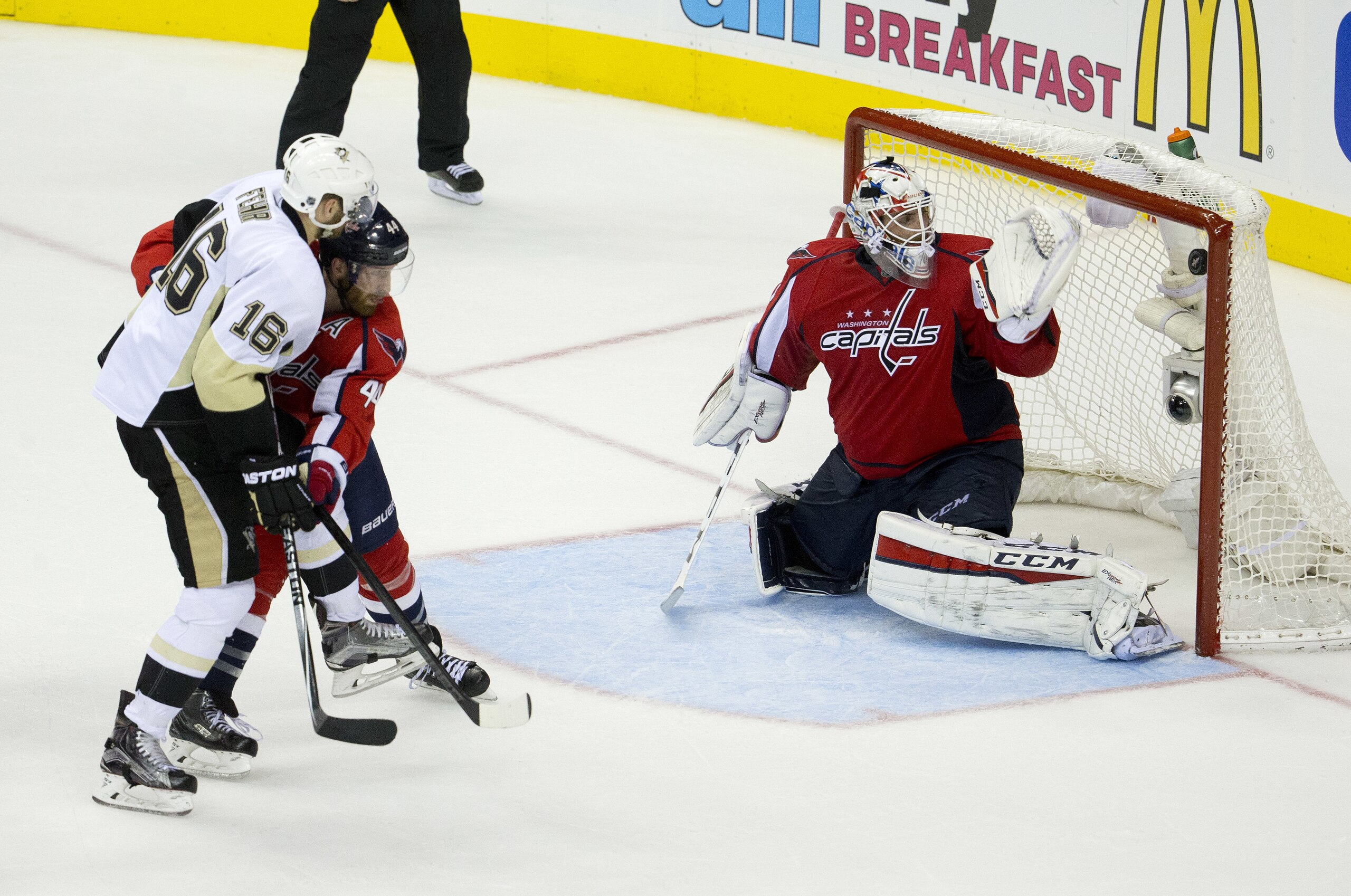 Pittsburgh Penguins right wing Eric Fehr (16) watches his shot go past Washington Capitals goalie Braden Holtby (70) for the tie-breaking goal, as Brooks Orpik defends during the third period of Game 2 in an NHL hockey Stanley Cup Eastern Conference semifinals Saturday, April 30, 2016 in Washington. Pittsburgh won 2-1. (AP Photo/Pablo Martinez Monsivais)