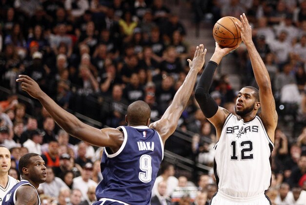 Apr 30, 2016; San Antonio, TX, USA; San Antonio Spurs power forward LaMarcus Aldridge (12) shoots the ball over Oklahoma City Thunder power forward Serge Ibaka (9) in game one of the second round of the NBA Playoffs at AT&T Center. Mandatory Credit: Soobum Im-USA TODAY Sports Apr 30, 2016; San Antonio, TX, USA; San Antonio Spurs power forward LaMarcus Aldridge (12) shoots the ball over Oklahoma City Thunder power forward Serge Ibaka (9) in game one of the second round of the NBA Playoffs at AT&T Center. Mandatory Credit: Soobum Im-USA TODAY Sports