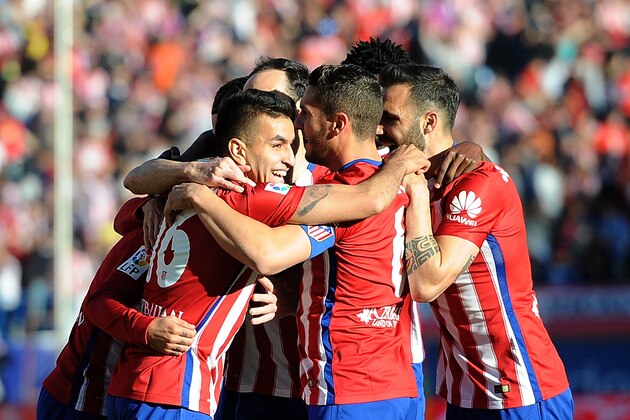 MADRID, SPAIN - APRIL 30:  Angel Correa of Club Atletico de Madrid celebrates after his team scored their opening goal during the La Liga match between Club Atletico de Madrid and Rayo Vallecano at Vicente Calderon Stadium on April 30, 2016 in Madrid, Spain.  (Photo by Denis Doyle/Getty Images)