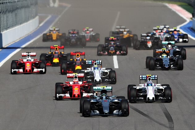 SOCHI, RUSSIA - MAY 01: Nico Rosberg of Germany driving the (6) Mercedes AMG Petronas F1 Team Mercedes F1 WO7 Mercedes PU106C Hybrid turbo leads at the start ahead of Kimi Raikkonen of Finland driving the (7) Scuderia Ferrari SF16-H Ferrari 059/5 turbo (Shell GP), Valtteri Bottas of Finland driving the (77) Williams Martini Racing Williams FW38 Mercedes PU106C Hybrid turbo and the rest of the field during the Formula One Grand Prix of Russia at Sochi Autodrom on May 1, 2016 in Sochi, Russia.  (Photo by Mark Thompson/Getty Images)