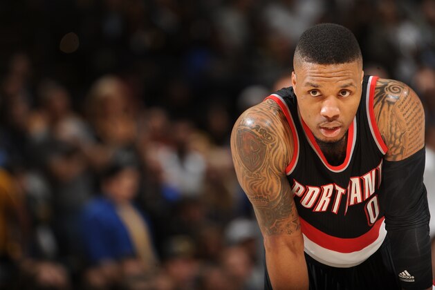 OAKLAND, CA - APRIL 3:  Damian Lillard #0 of the Portland Trail Blazers during the game against the Golden State Warriors on April 3, 2016 at Oracle Arena in Oakland, California. NOTE TO USER: User expressly acknowledges and agrees that, by downloading and or using this photograph, user is consenting to the terms and conditions of Getty Images License Agreement. Mandatory Copyright Notice: Copyright 2016 NBAE (Photo by Noah Graham/NBAE via Getty Images)