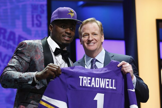 Apr 28, 2016; Chicago, IL, USA; Laquon Treadwell (Mississippi) with NFL commissioner Roger Goodell after being selected by the Minnesota Vikings as the number twenty-three overall pick in the first round of the 2016 NFL Draft at Auditorium Theatre. Mandatory Credit: Kamil Krzaczynski-USA TODAY Sports