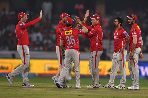 Kings XI Punjab's team celebrates the wicket of Eoin Morgan of  Sunrisers Hyderabad during the 2016 Indian Premier League (IPL) Twenty20 cricket match between Sunrisers Hyderabad and Kings XI Punjab at The Rajiv Gandhi International Stadium in Hyderabad on April 23, 2016.  / AFP / Noah SEELAM / ----IMAGE RESTRICTED TO EDITORIAL USE - STRICTLY NO COMMERCIAL USE----- / GETTYOUT        (Photo credit should read NOAH SEELAM/AFP/Getty Images)
