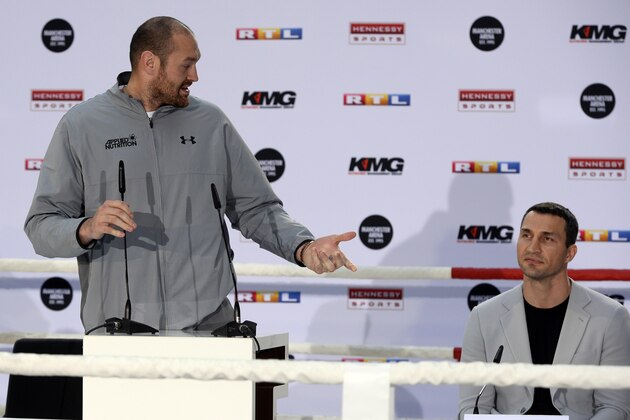 Ukrainian boxer Wladimir Klitschko (R) and British heavyweight world champion Tyson Fury give a press conference in Cologne, western Germany, on April 28, 2016, where they talked about their re-match-fight for the title to take place on July 9, 2016 in Manchester, Great Britain.
Hamburg-based Klitschko lost his WBA, IBF, IBO and WBO belts to Britain's Fury on points in Duesseldorf in November 2015 as the Ukrainian suffered his first defeat in more than a decade. / AFP / Roberto Pfeil        (Photo credit should read ROBERTO PFEIL/AFP/Getty Images)