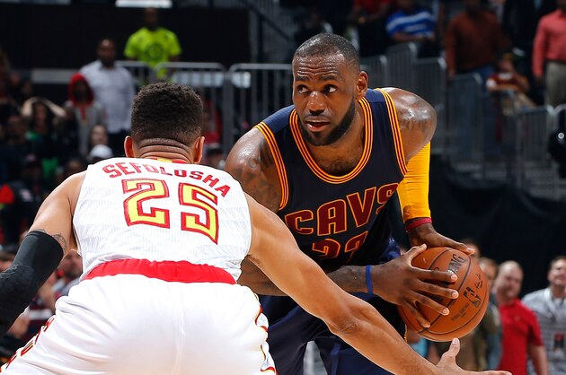 ATLANTA, GEORGIA - APRIL 01:  LeBron James #23 of the Cleveland Cavaliers looks to drive against Thabo Sefolosha #25 of the Atlanta Hawks at Philips Arena on April 1, 2016 in Atlanta, Georgia.  NOTE TO USER User expressly acknowledges and agrees that, by downloading and or using this photograph, user is consenting to the terms and conditions of the Getty Images License Agreement.  (Photo by Kevin C. Cox/Getty Images)