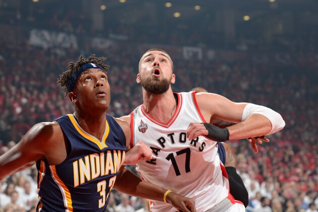 TORONTO, CANADA - MAY 1:  Myles Turner #33 of the Indiana Pacers fights for position against Jonas Valanciunas #17 of the Toronto Raptors in Game Seven of the Eastern Conference Quarterfinals during the 2016 NBA Playoffs on May 1, 2016 at the Air Canada Centre in Toronto, Ontario, Canada.  NOTE TO USER: User expressly acknowledges and agrees that, by downloading and or using this Photograph, user is consenting to the terms and conditions of the Getty Images License Agreement.  Mandatory Copyright Notice: Copyright 2016 NBAE  (Photo by Ron Turenne/NBAE via Getty Images)